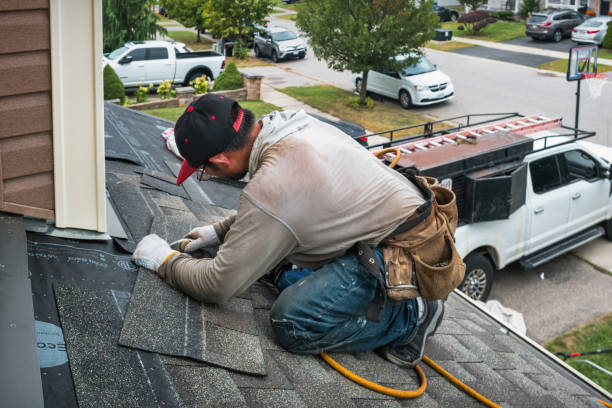 Professional Gutter Installation technician working in Reedsport, OR